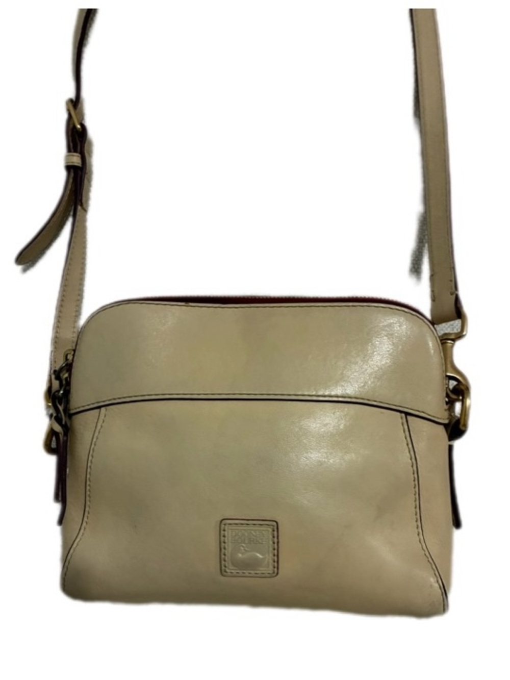 Dooney & Bourke Florentine Cameron
Crossbody bag in an ecru/beige leather